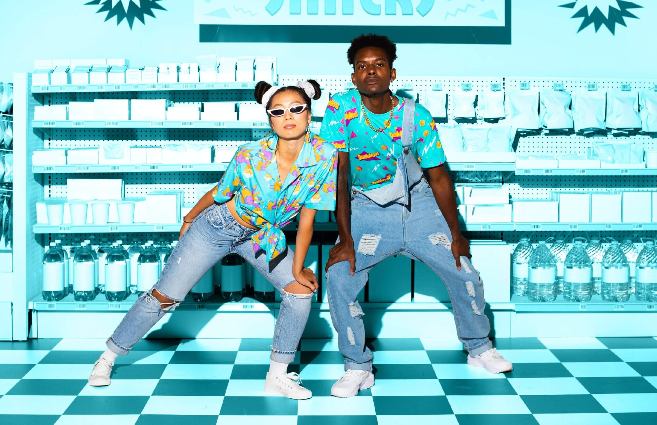 Two people in Dunkaroos merchandise standing in an isle of a store
